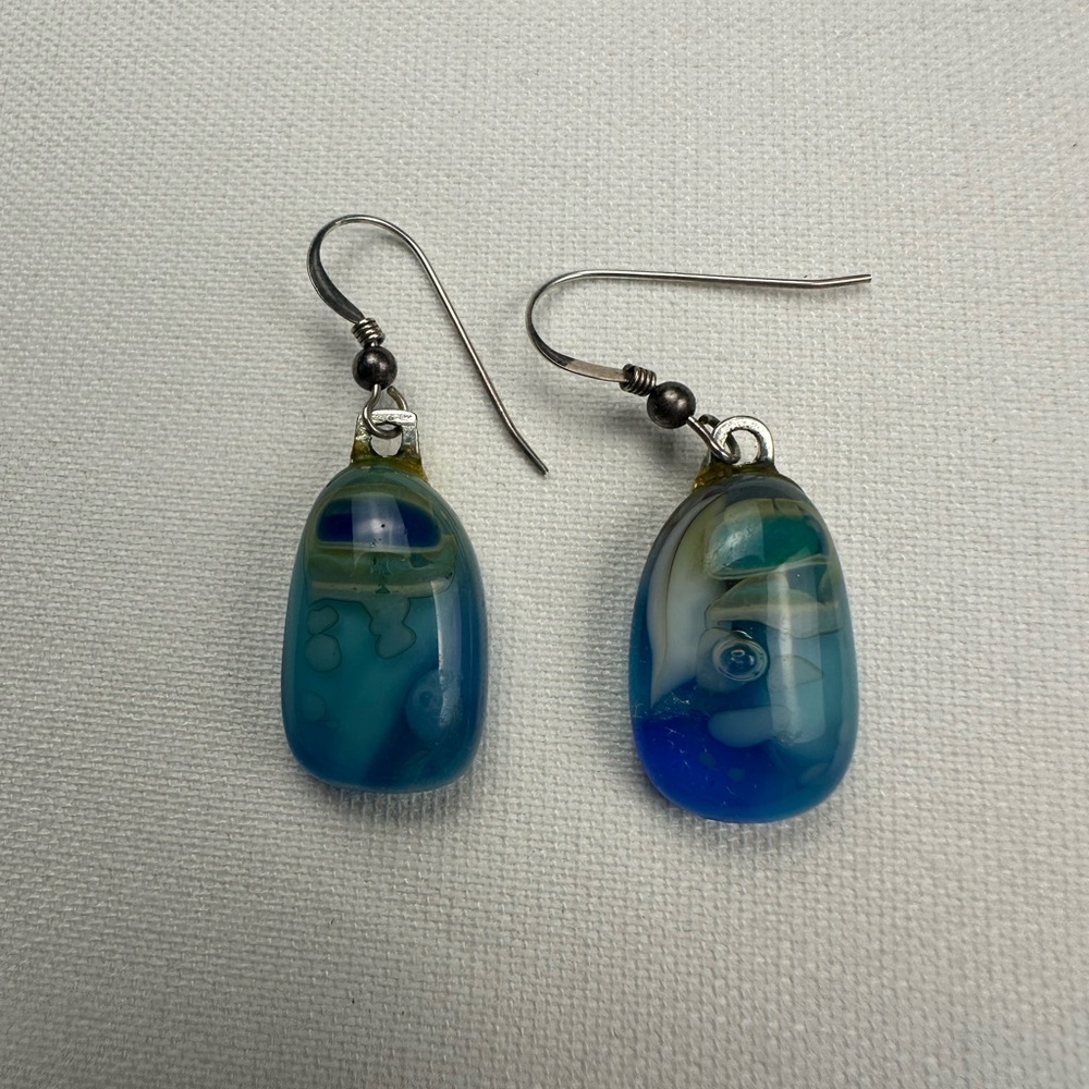 Blue swirled dangle earrings. Costume jewelry